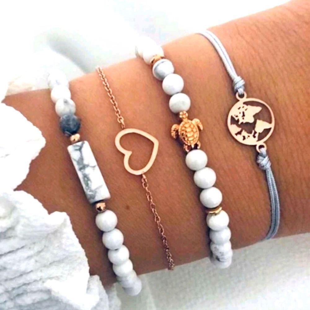 Set of 4 Fashionable Gray & White Bracelets with Gold Accents